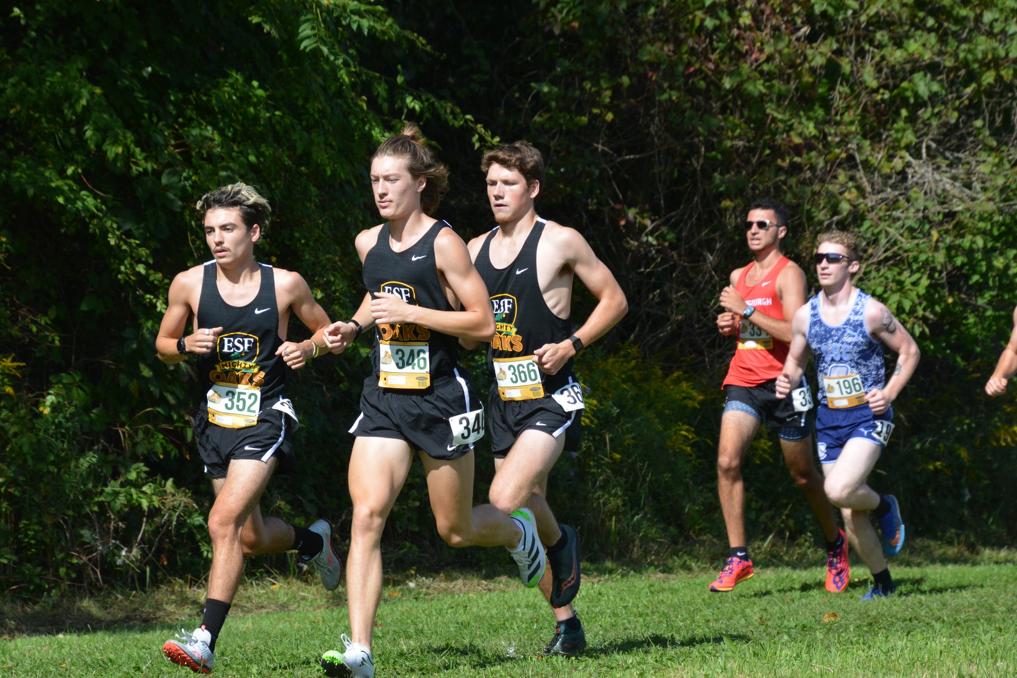 Men's and Women's Cross Country teams each win invites